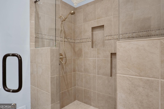 bathroom featuring an enclosed shower