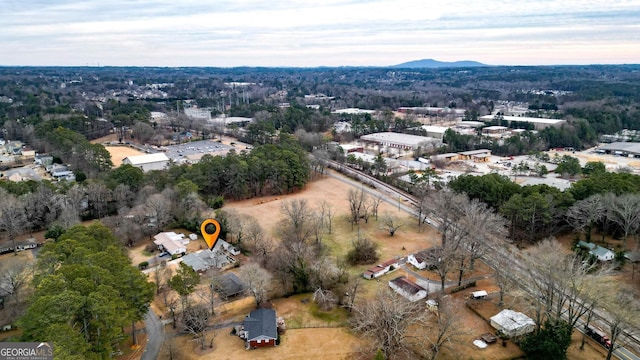 drone / aerial view featuring a mountain view