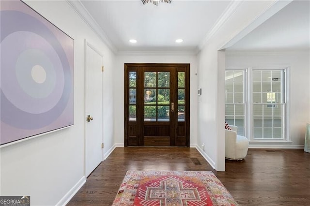 entrance foyer featuring dark wood-type flooring and crown molding