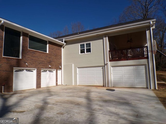 view of side of home featuring a garage