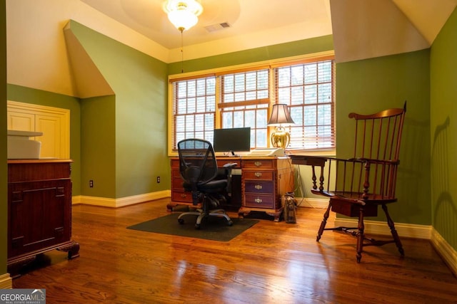 home office featuring plenty of natural light and wood-type flooring