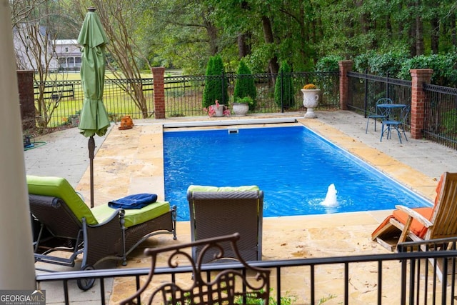 view of pool with a patio