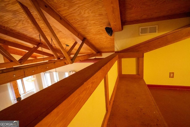 hall featuring wood ceiling and vaulted ceiling with beams