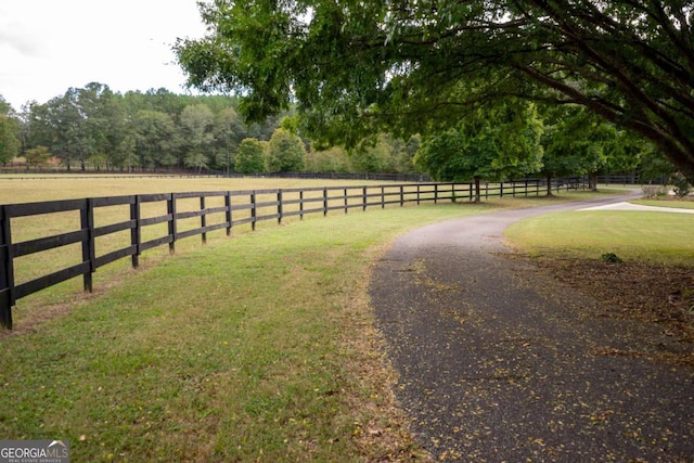 exterior space with a rural view