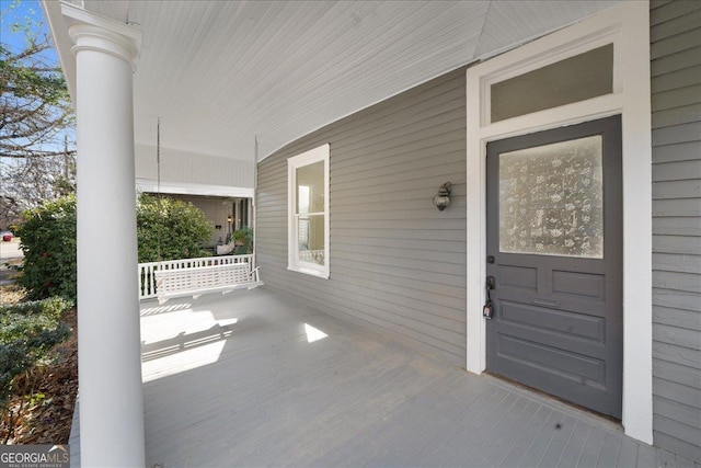 entrance to property with covered porch