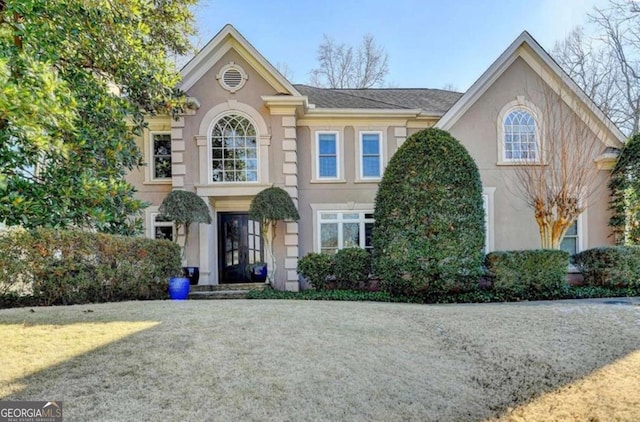 view of front of property with a front lawn