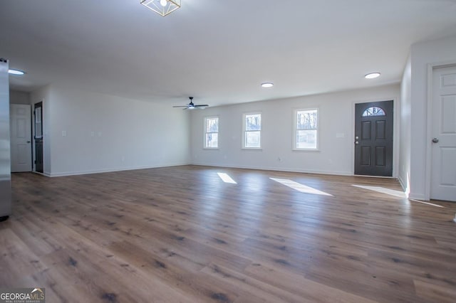 entryway featuring hardwood / wood-style flooring and ceiling fan