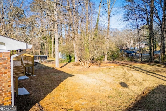 view of yard featuring a deck