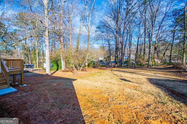 view of yard with a deck