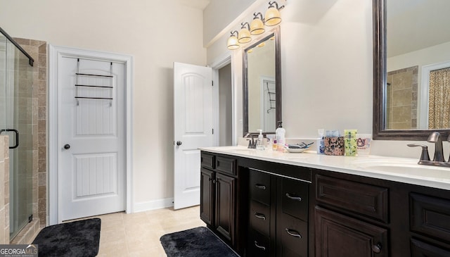 full bath with double vanity, a stall shower, and a sink