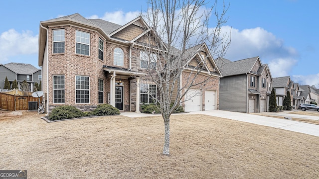 view of front of house with a garage and a front yard