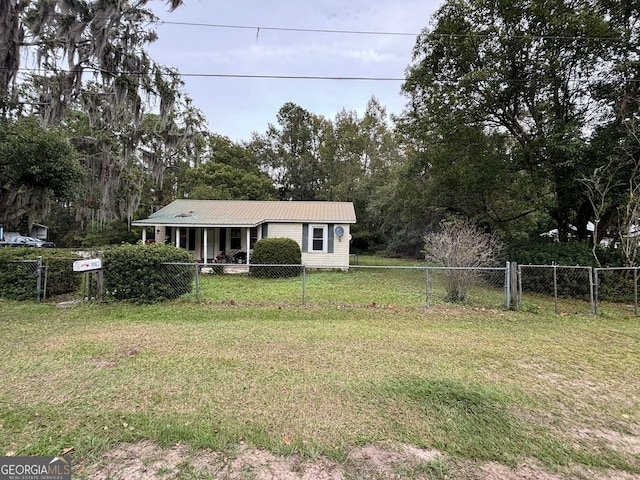 exterior space featuring a front lawn