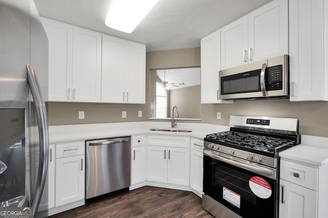 kitchen featuring white cabinets, sink, and stainless steel appliances