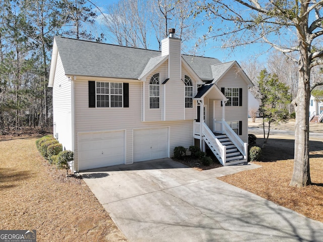 split foyer home featuring a garage