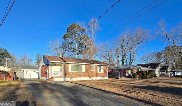 view of front of house featuring a carport