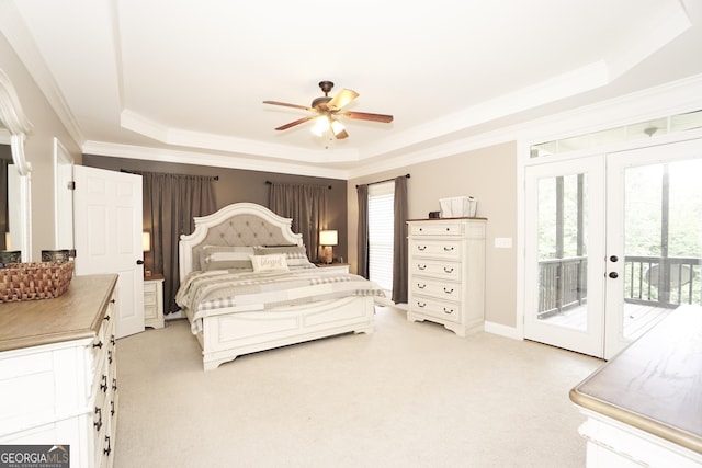 carpeted bedroom with french doors, access to outside, ornamental molding, a raised ceiling, and ceiling fan