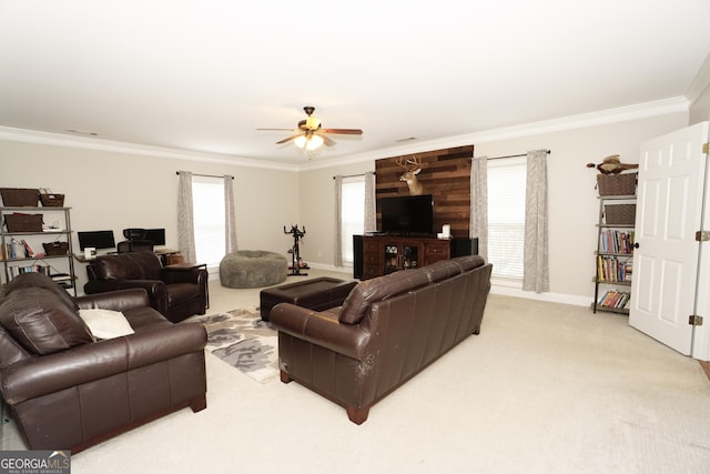 living room with light carpet, ceiling fan, and ornamental molding