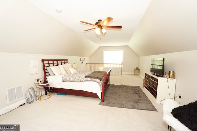 carpeted bedroom featuring ceiling fan and lofted ceiling