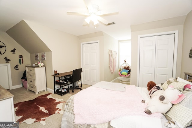 bedroom featuring ceiling fan and light carpet