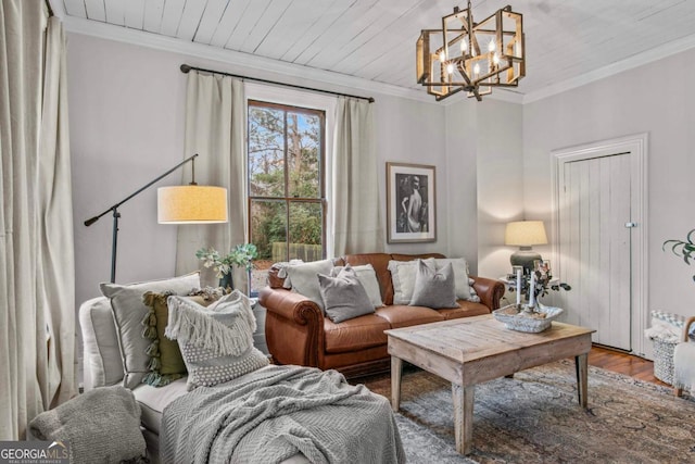 interior space featuring crown molding, hardwood / wood-style floors, and an inviting chandelier