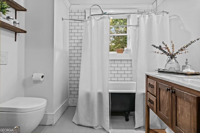 full bathroom with ornamental molding, vanity, toilet, shower / bath combo, and tile patterned floors