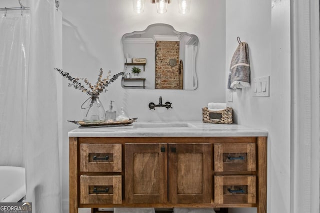 bathroom featuring vanity and walk in shower