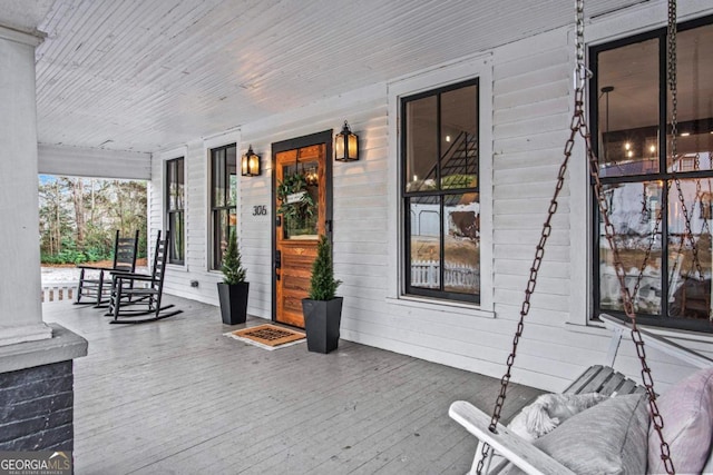 wooden deck with a porch