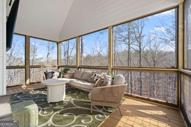 sunroom with lofted ceiling