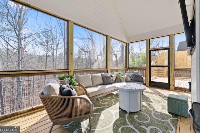 sunroom with vaulted ceiling