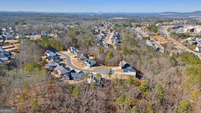 bird's eye view with a residential view and a forest view