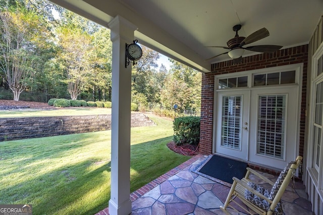 view of patio with ceiling fan and french doors