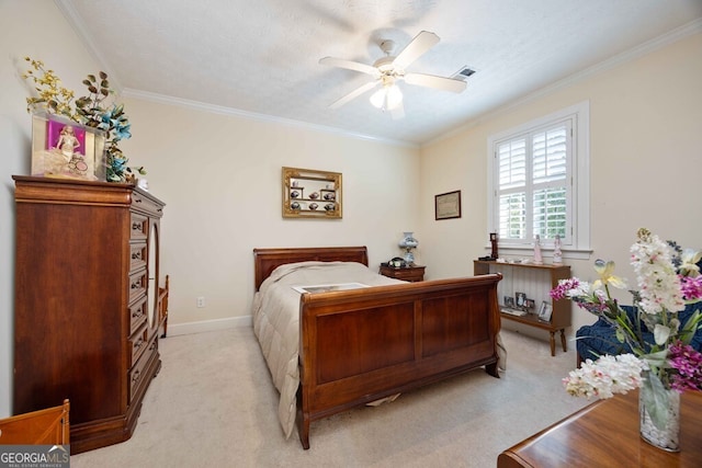 carpeted bedroom with ceiling fan, a textured ceiling, and crown molding