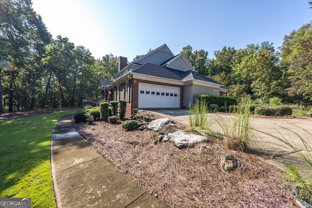 view of side of property featuring a garage