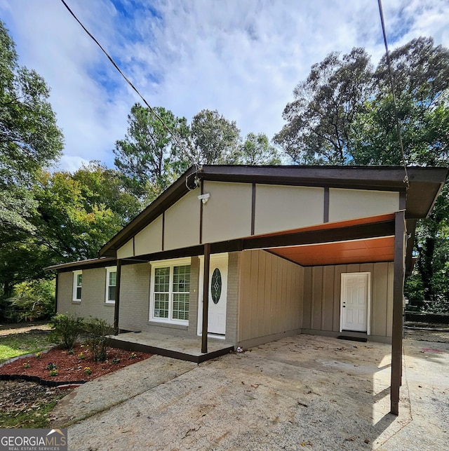 view of front of house with a carport