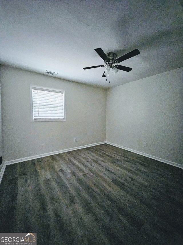 spare room with ceiling fan