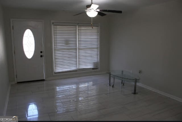 entryway with ceiling fan