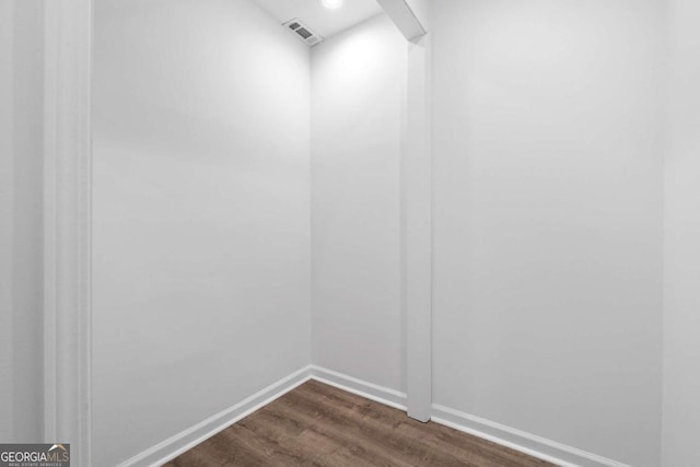 interior space with dark hardwood / wood-style flooring