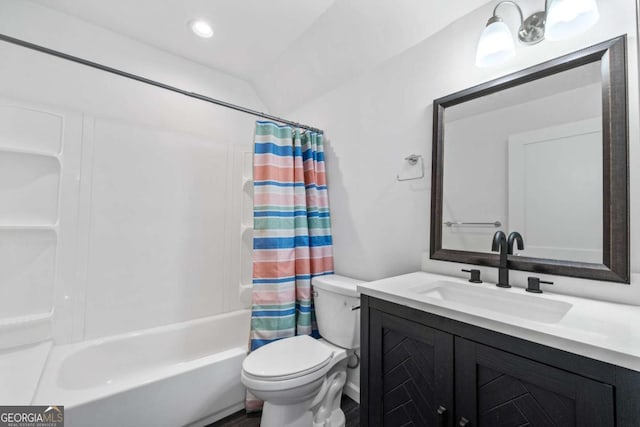 full bathroom featuring toilet, vanity, shower / tub combo with curtain, and vaulted ceiling