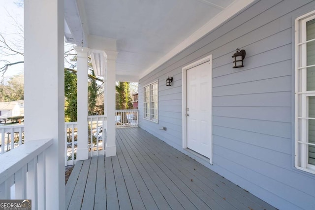 deck featuring covered porch