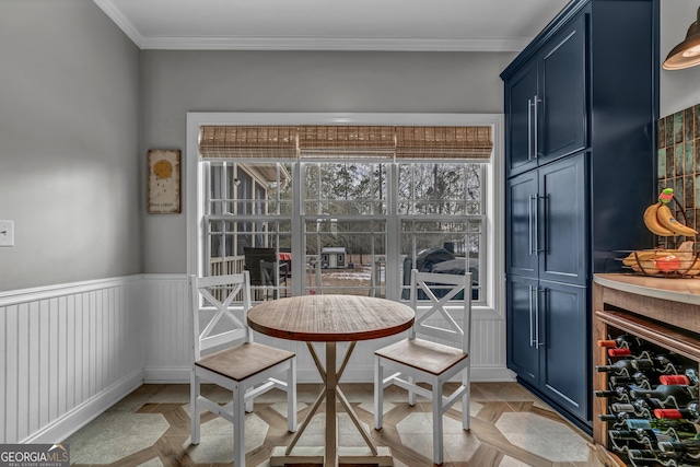 dining area with crown molding