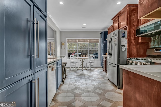 kitchen featuring crown molding and appliances with stainless steel finishes