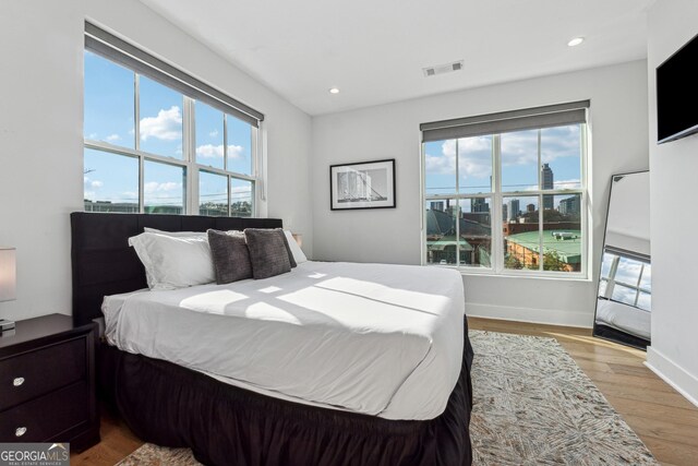 bedroom featuring hardwood / wood-style flooring