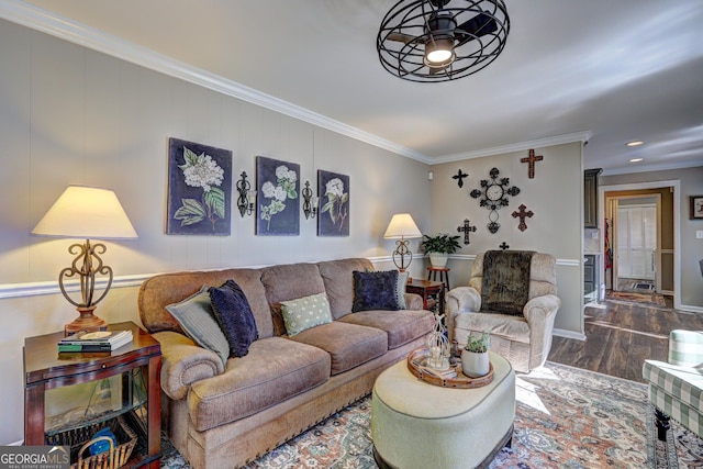 living room featuring dark wood-type flooring and ornamental molding