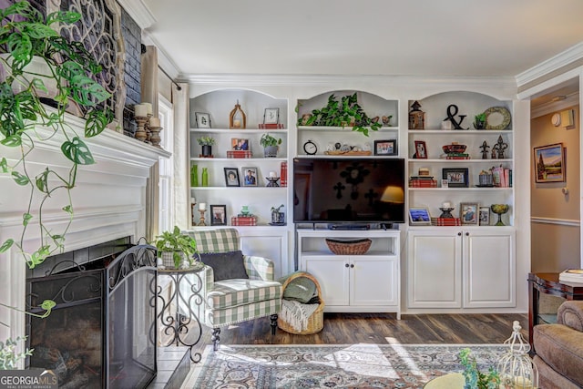 living room featuring dark wood-type flooring and ornamental molding