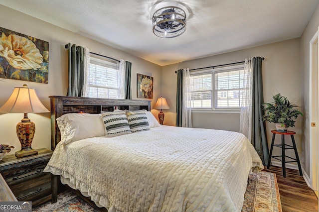 bedroom featuring hardwood / wood-style floors