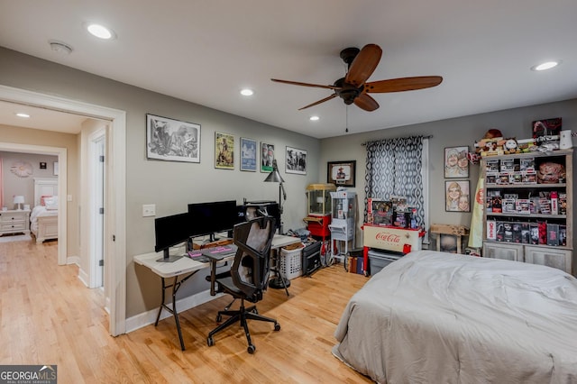 bedroom with light wood-type flooring and ceiling fan