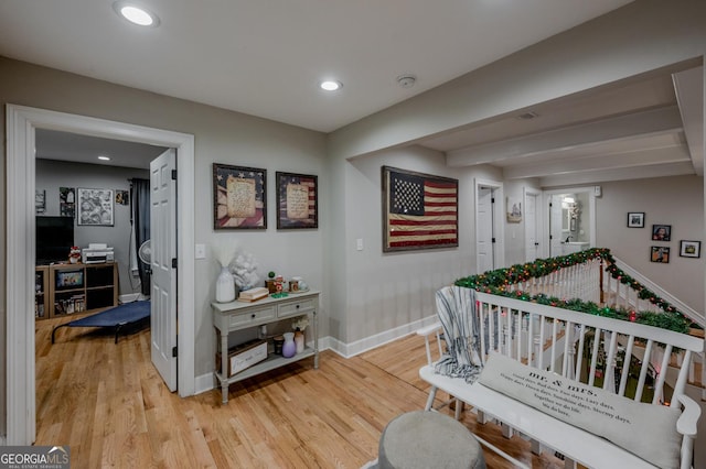 corridor featuring hardwood / wood-style floors