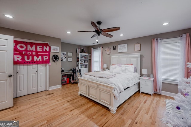 bedroom featuring ceiling fan and light wood-type flooring