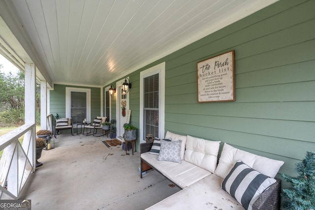 view of patio featuring covered porch and outdoor lounge area