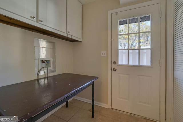 interior space with light tile patterned floors